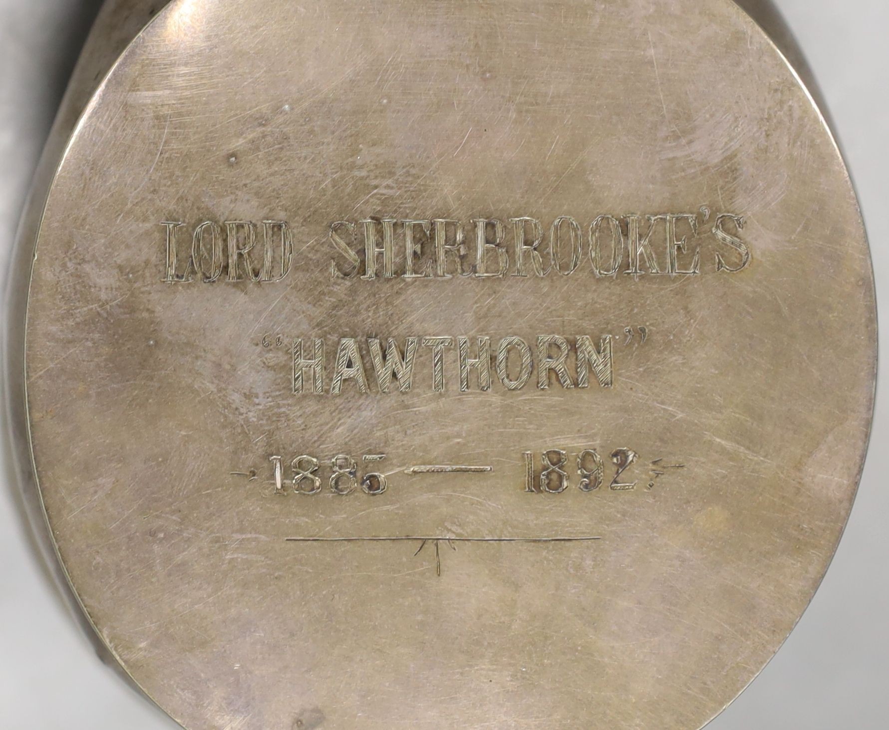 A Victorian horse’s hoof desk weight, electroplated mount inscribed, ‘Lord Sherbrooke’s Hawthorne, 1885-1892’, 8 cms high.